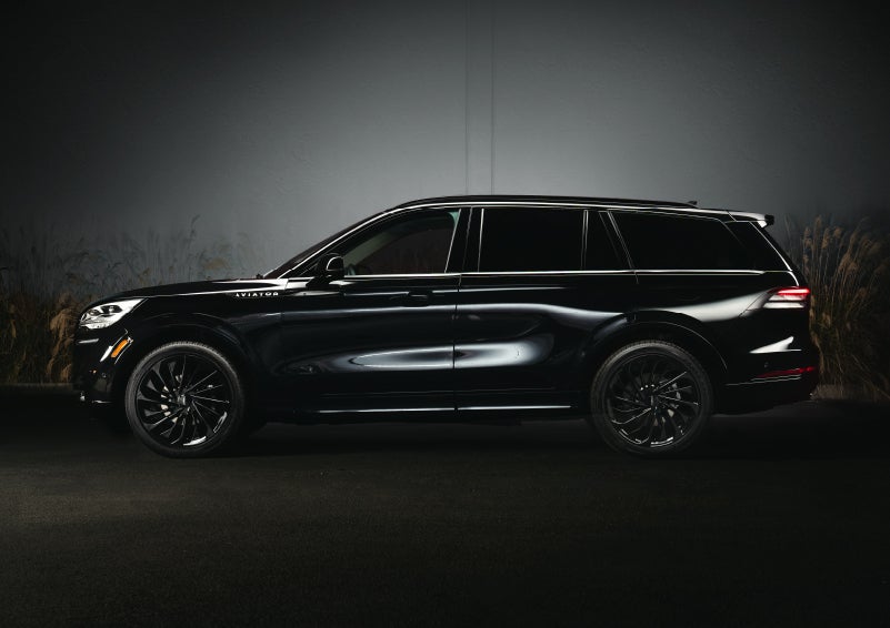 A 2024 Lincoln Aviator® SUV is shown in the Infinite Black exterior color | Dave Sinclair Lincoln St. Peters in Saint Peters MO