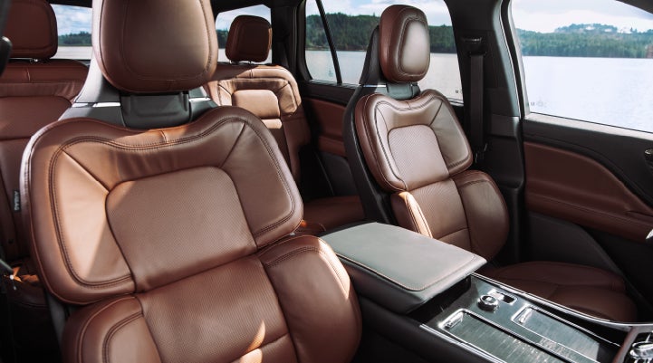 The front row's Perfect Position Seats in a 2024 Lincoln Aviator® Reserve model with Ebony Roast interior | Dave Sinclair Lincoln St. Peters in Saint Peters MO